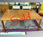 Incredible Dyrlund Danish Teak dining room table with leaf. The table is 28"h x 41"w x 62"l the leaf is another 20"w making the table 82" in total length. The table is SOLID Teak and in great condition. It is really heavy!.
